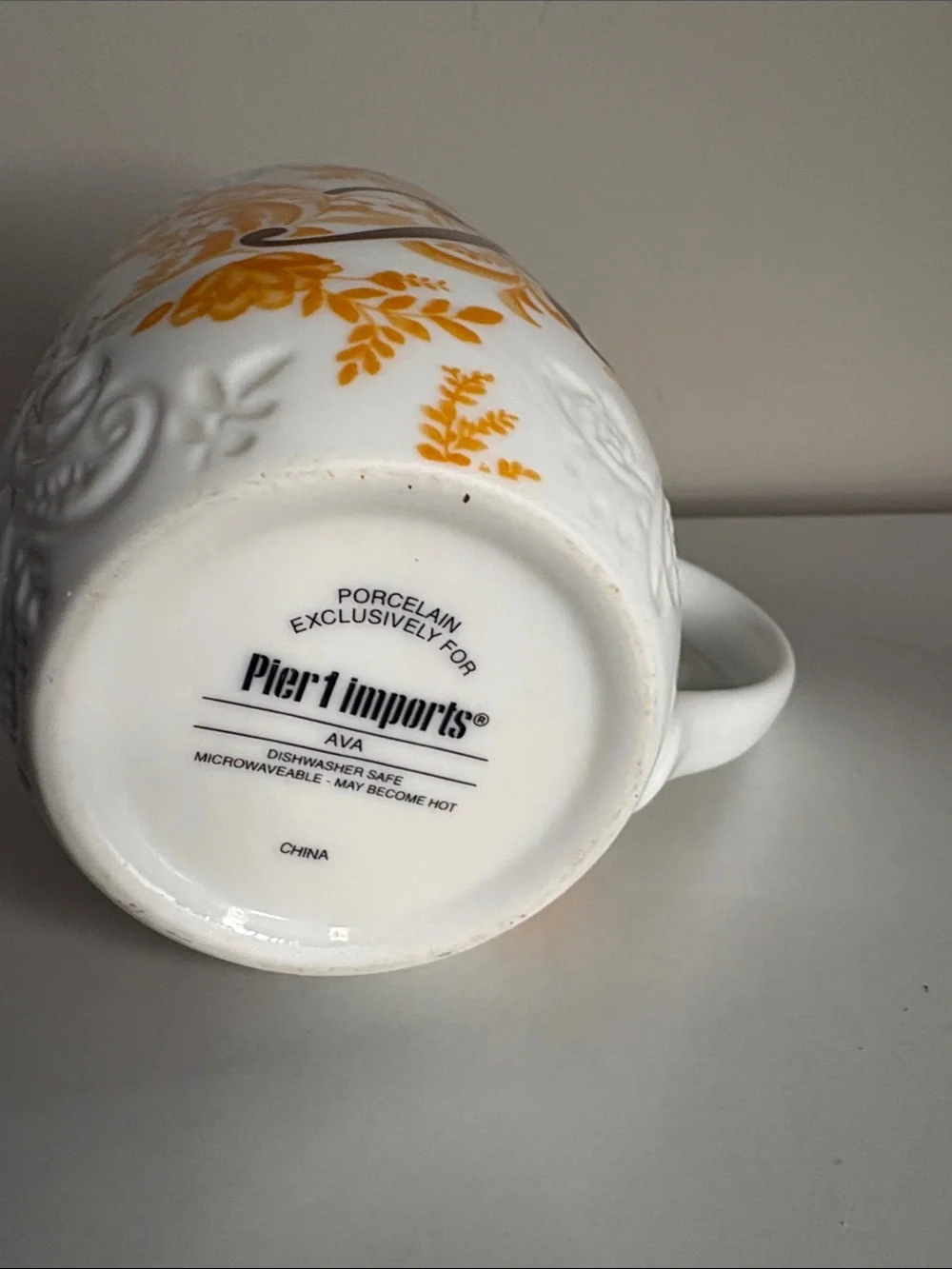 Pier 1 White Mug with Orange and Brown Flourish and 'K' Monogram